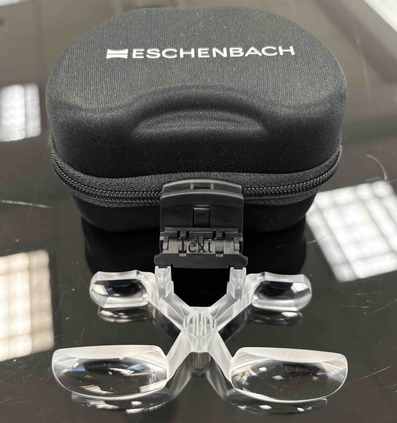 Clip-on magnifier for vision impaired people