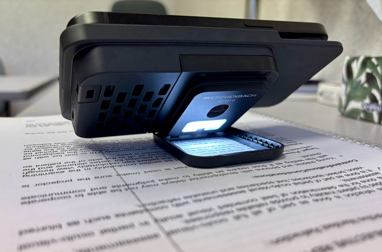 a picture of optaro digital magnifier for iphone